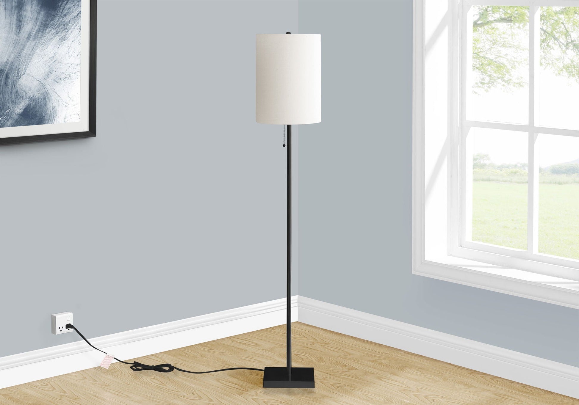 Floor lamp with white drum shade on a slim black metal stem and square base, pull chain on Tampa Home & Garden Store