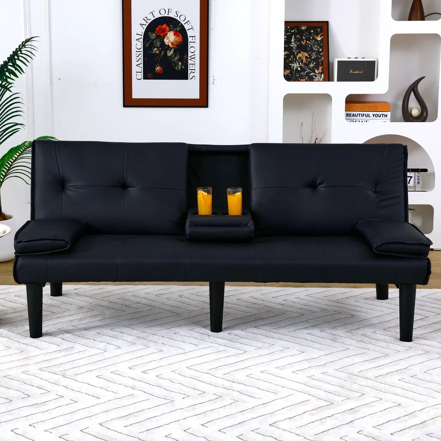 Sofa bed with foldable design and cup holders in black leather by Unique Piece Furniture on Tampa Home & Garden Store