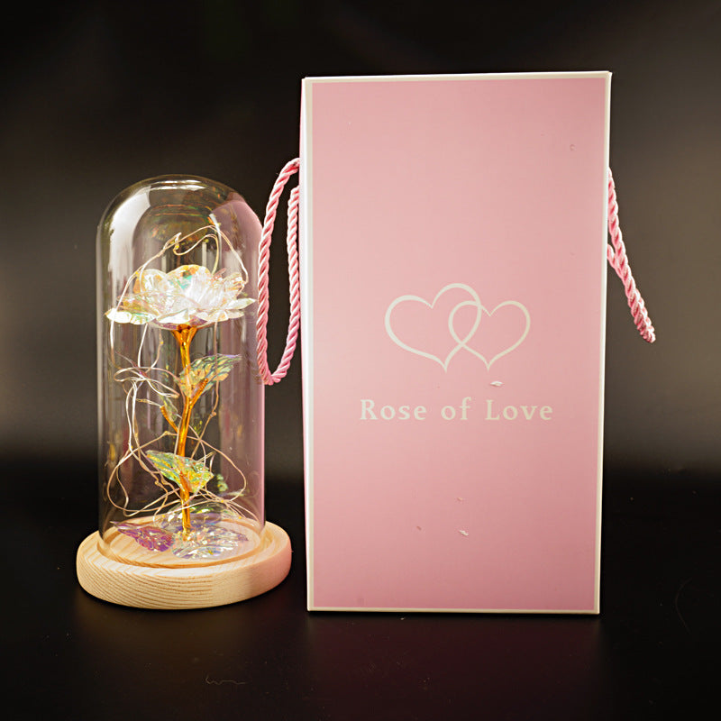 Gold foil rose preserved flower under glass dome on wooden base with pink Rose of Love gift box on Tampa Home & Garden Store