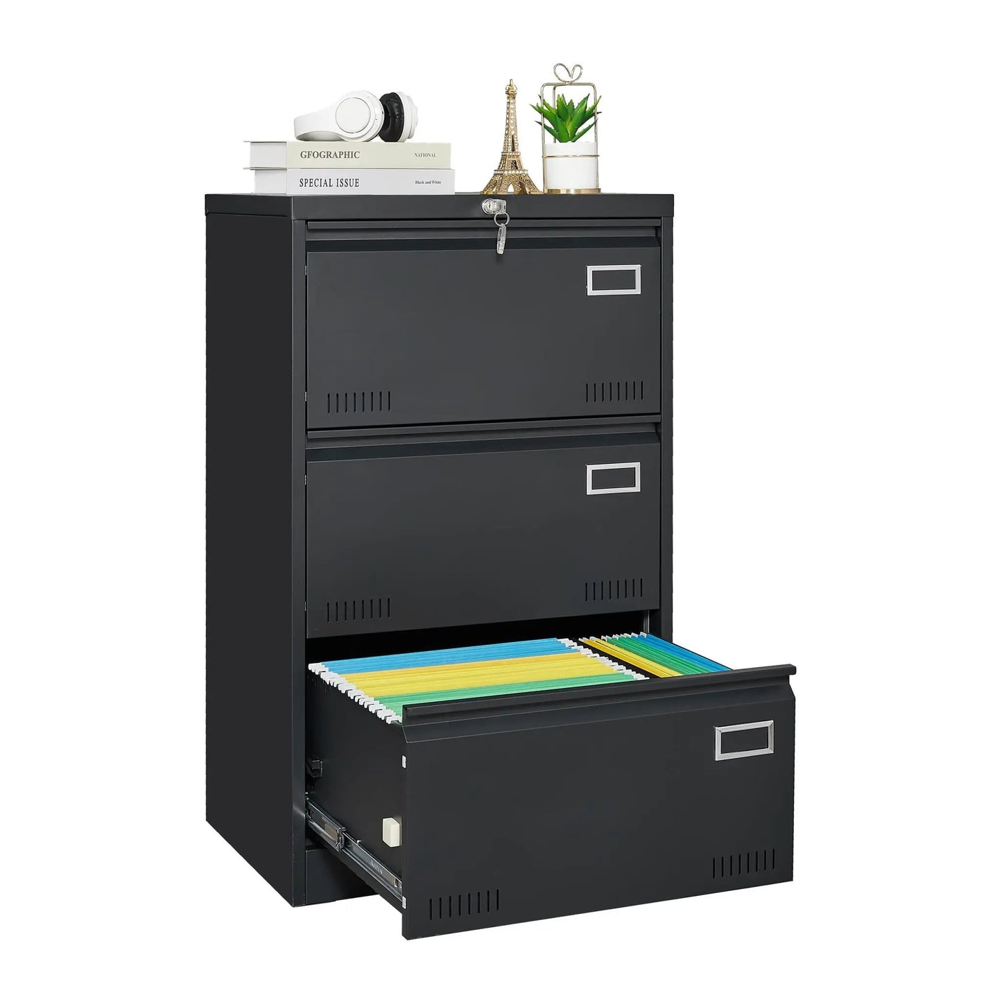 Three-drawer locking filing cabinet in black metal with label slots; bottom drawer holds colored hanging files on Tampa Home & Garden Store