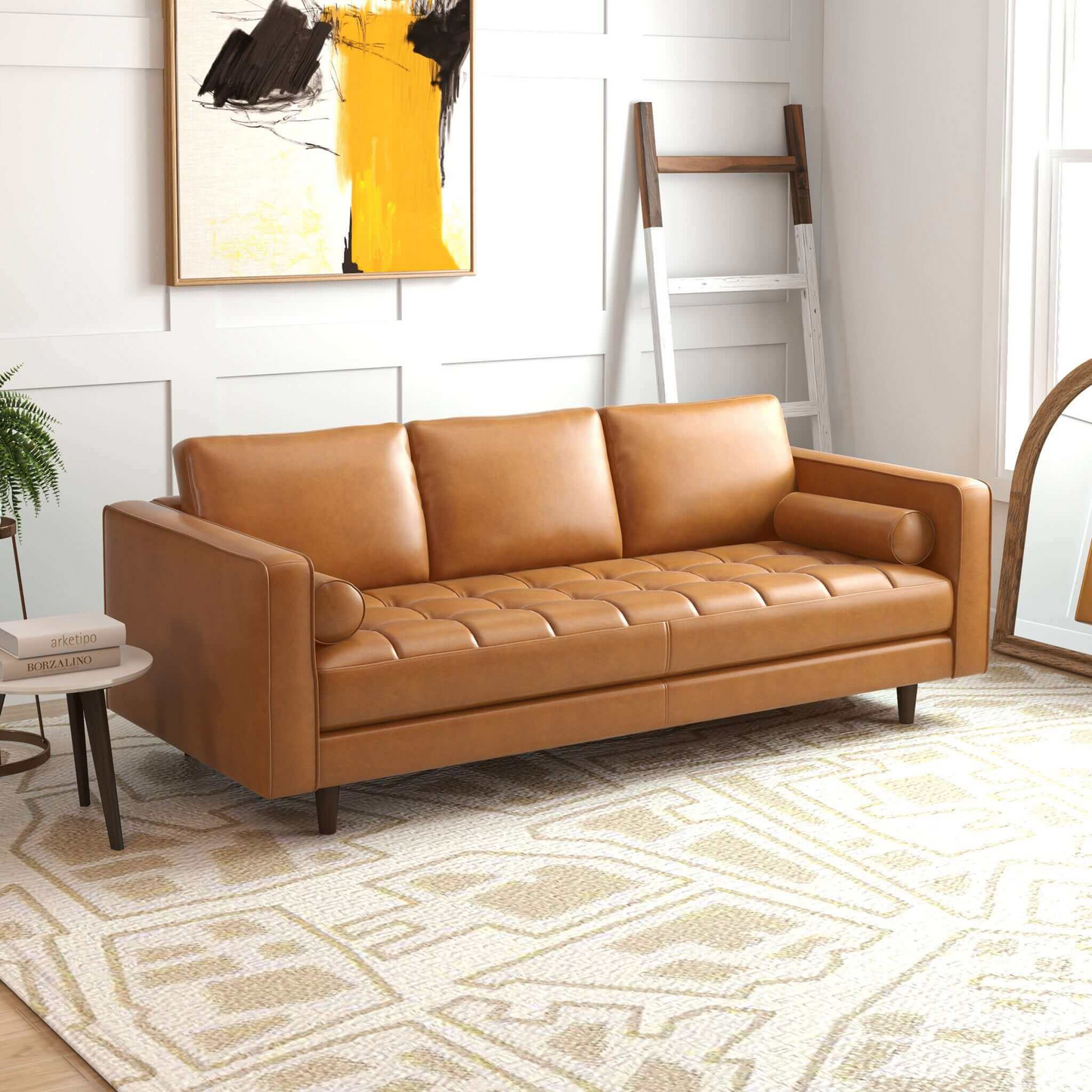 Catherine Sofa tan leather tufted sofa by HouseOfZazla in a living room with yellow art on Tampa Home & Garden Store
