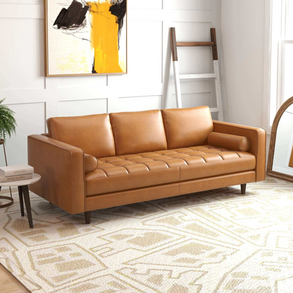 Catherine Sofa tan leather tufted sofa by HouseOfZazla in a living room with yellow art on Tampa Home & Garden Store
