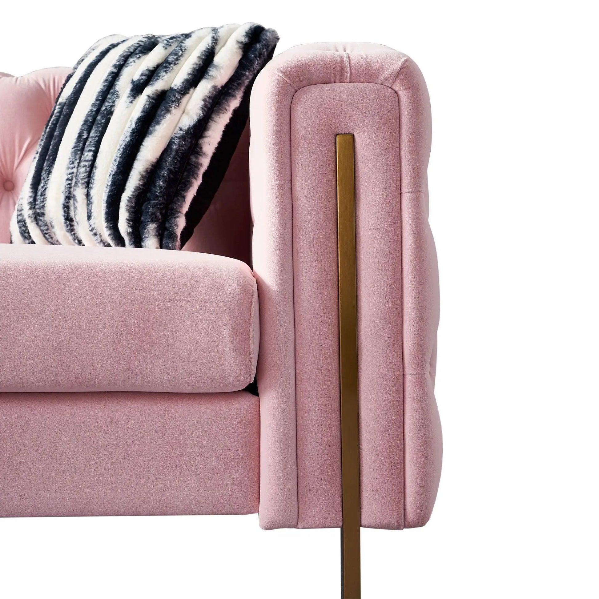 Chesterfield modern tufted pink sofa with gold metal rail and striped faux fur throw Unique Piece Furniture on Tampa Home & Garden Store