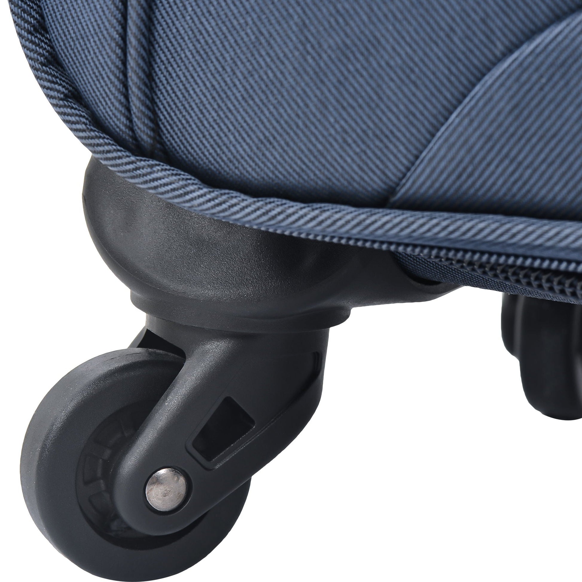 Softside luggage wheel closeup in dark blue fabric with spinner caster on Tampa Home & Garden Store