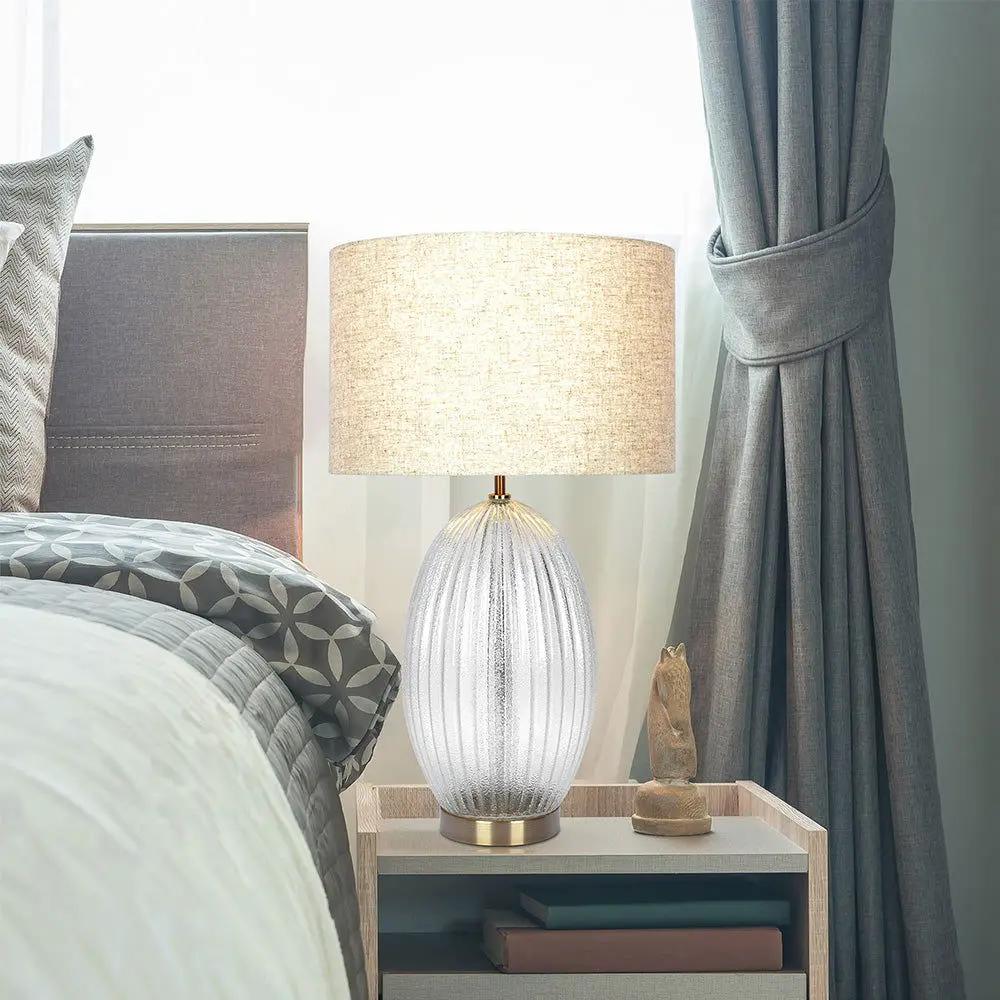 Aurora ribbed clear table lamp with beige shade and gold accents by Unique Piece Furniture on Tampa Home & Garden Store