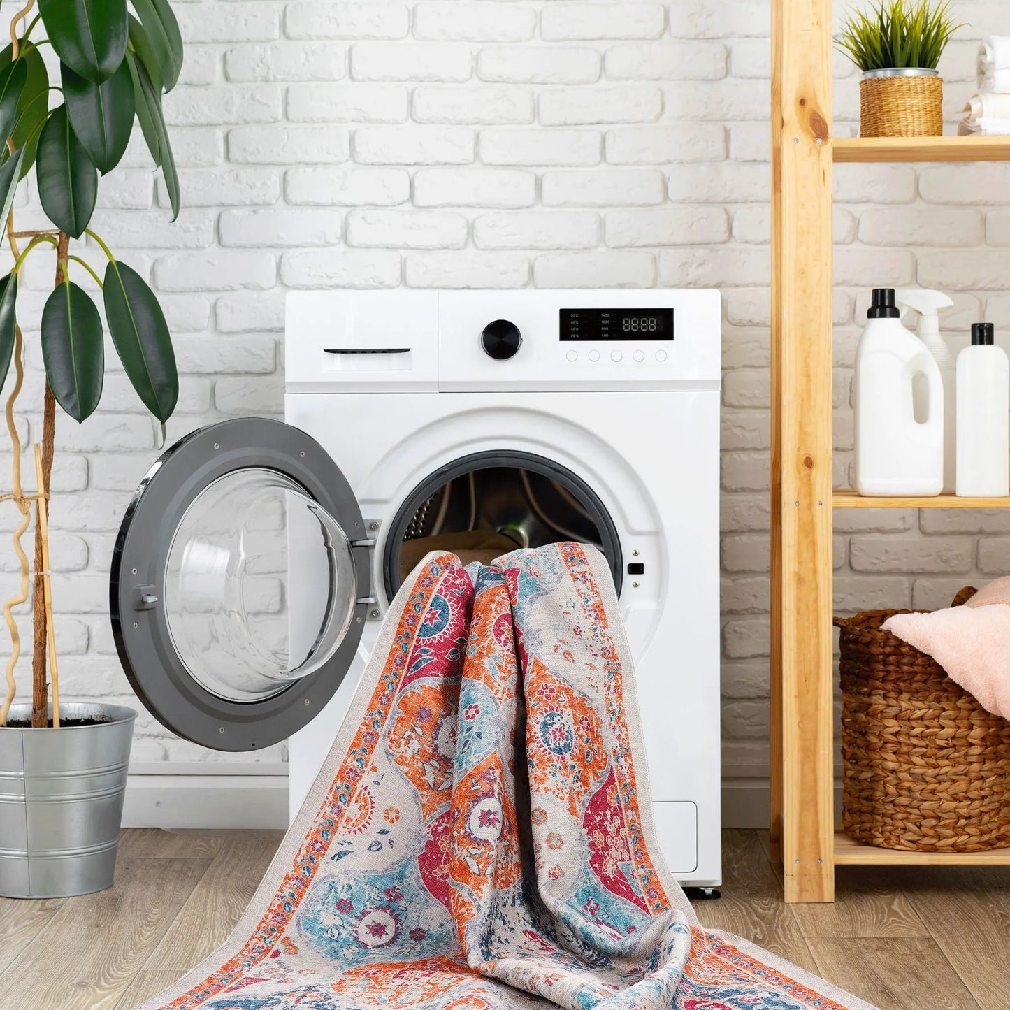 Maval washable area rug colorful pattern draped over washing machine in laundry room on Tampa Home & Garden Store