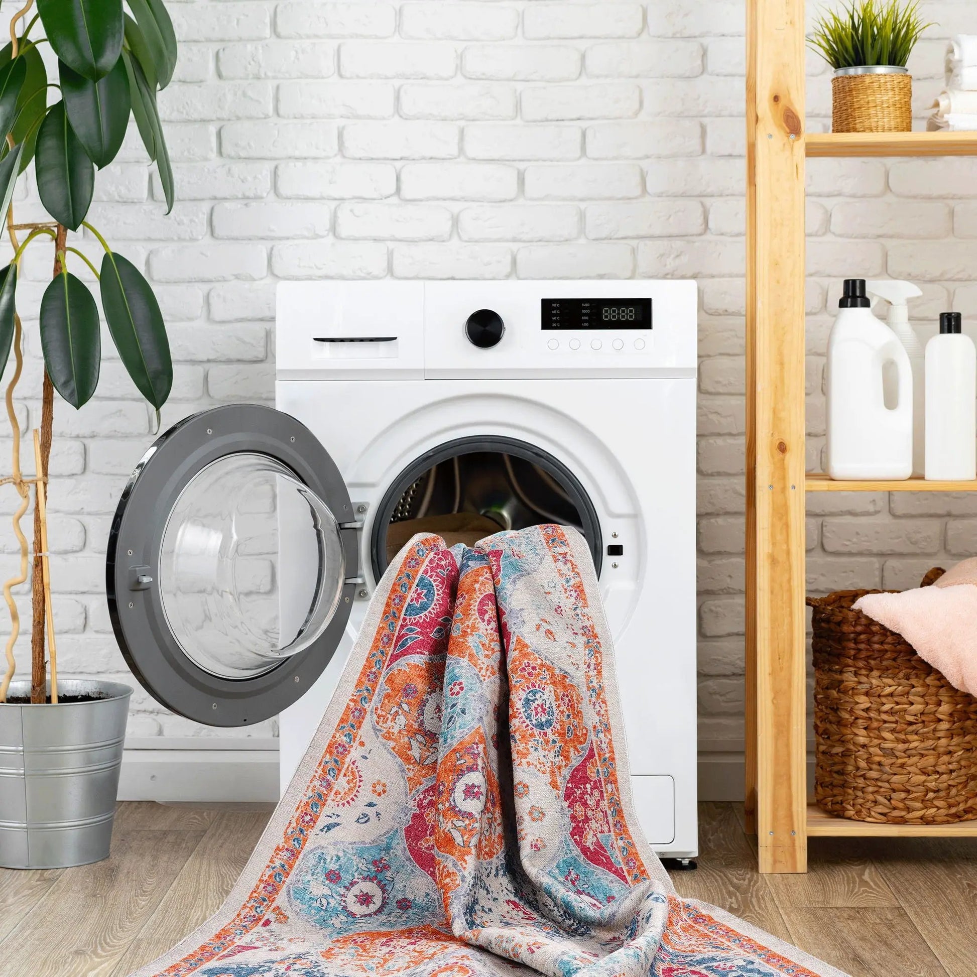 Maval washable area rug colorful pattern draped over washing machine in laundry room on Tampa Home & Garden Store