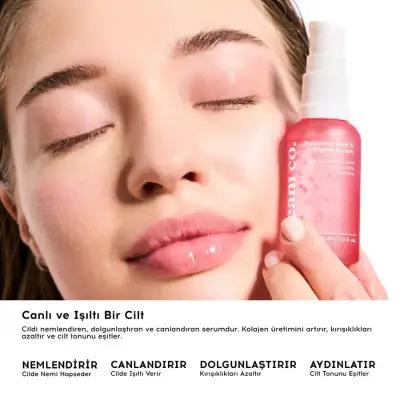Face serum pink bottle held near model's face from Brightening Care Set on Tampa Home & Garden Store