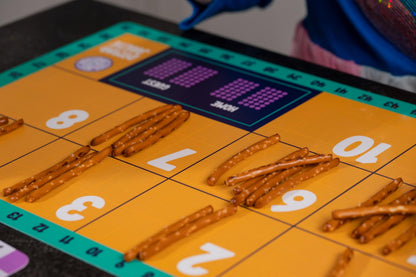 3-pack Math Placemat Bundle yellow placemats with teal border purple dotted number blocks and pretzel sticks on Tampa Home & Garden Store