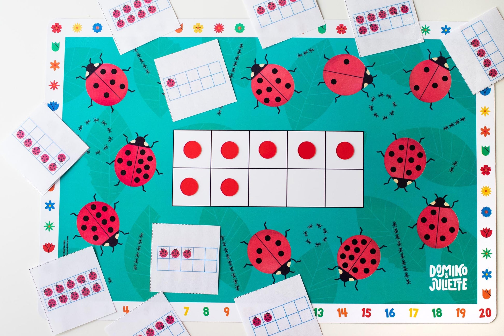 3-pack Math Placemat Bundle Domino & Juliette featuring turquoise ladybug placemats and number grids on Tampa Home & Garden Store