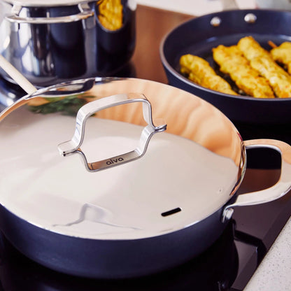 Alva Ceramic Nonstick Cookware Set copper pots with glass lids and a frying pan visible on Tampa Home & Garden Store