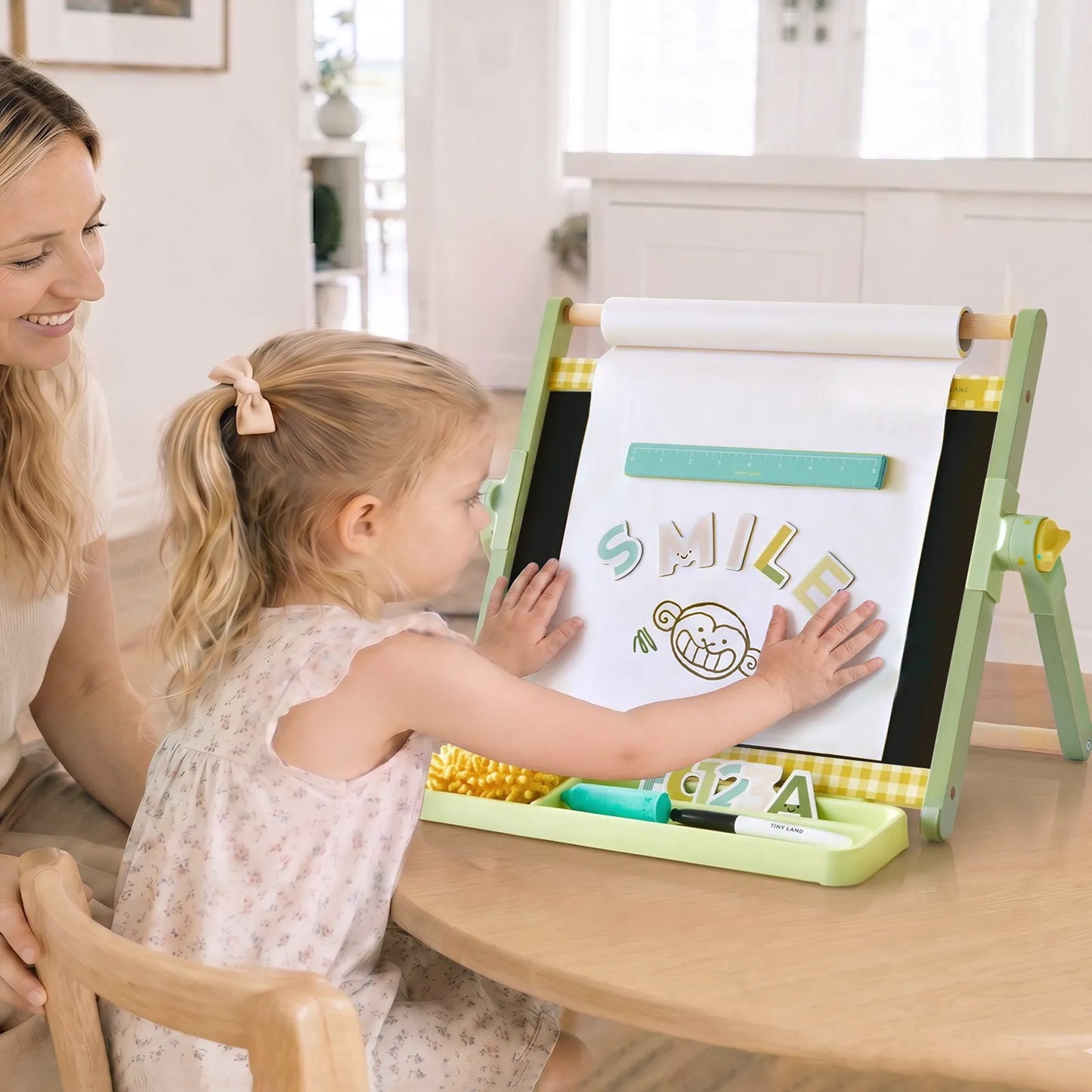 Tiny Land Double-Sided Magnetic Tabletop Easel for kids with green frame and white paper sheet on Tampa Home & Garden Store
