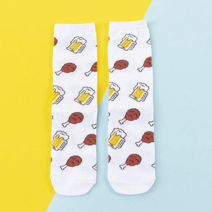 Pair of Stevvex women's cotton crew socks with fruit motifs (banana, lemon, avocado) white on Tampa Home & Garden Store