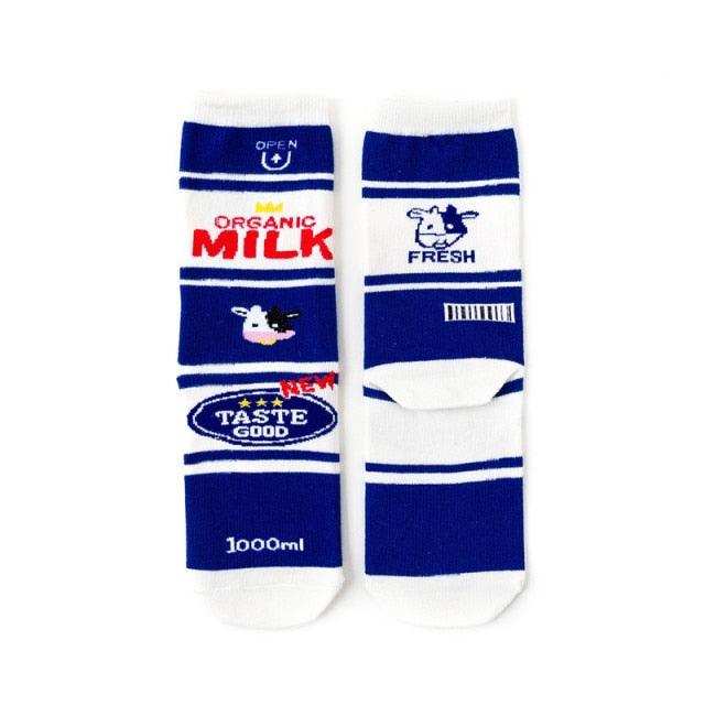 Stevvex women's crew socks pair in blue and white with retro dairy prints, milk label, cow illustration on Tampa Home & Garden Store
