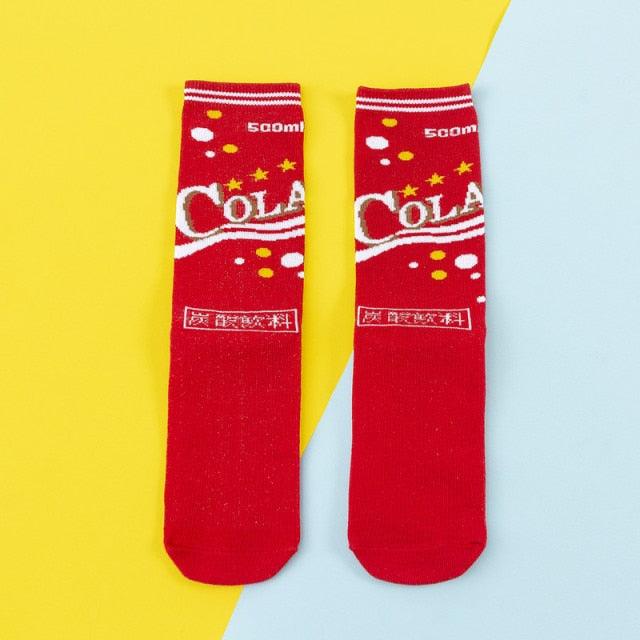 Women's red cotton crew socks with white cola-style logo and colorful spots pair on Tampa Home & Garden Store