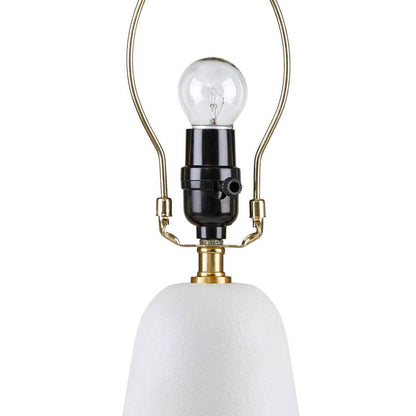 Textured white ceramic table lamp with brass hardware and clear bulb by HouseOfZazla on Tampa Home & Garden Store