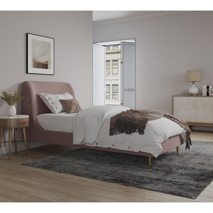 Mid-Century Modern Upholstered Bed with blush curved headboard and white linen in a bedroom on Tampa Home & Garden Store