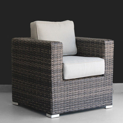 Patio arm chair in dark woven rattan with light beige cushions outdoor chair on Tampa Home & Garden Store