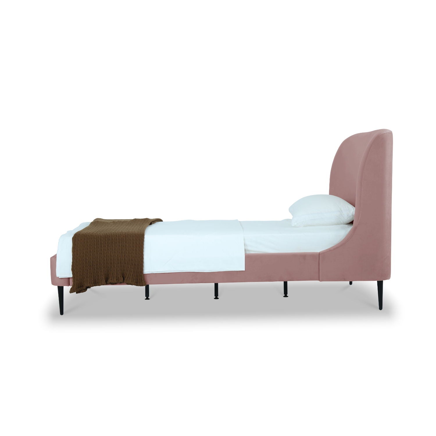 Heather upholstered bed with curved pink headboard, black legs, white bedding, brown throw on Tampa Home & Garden Store
