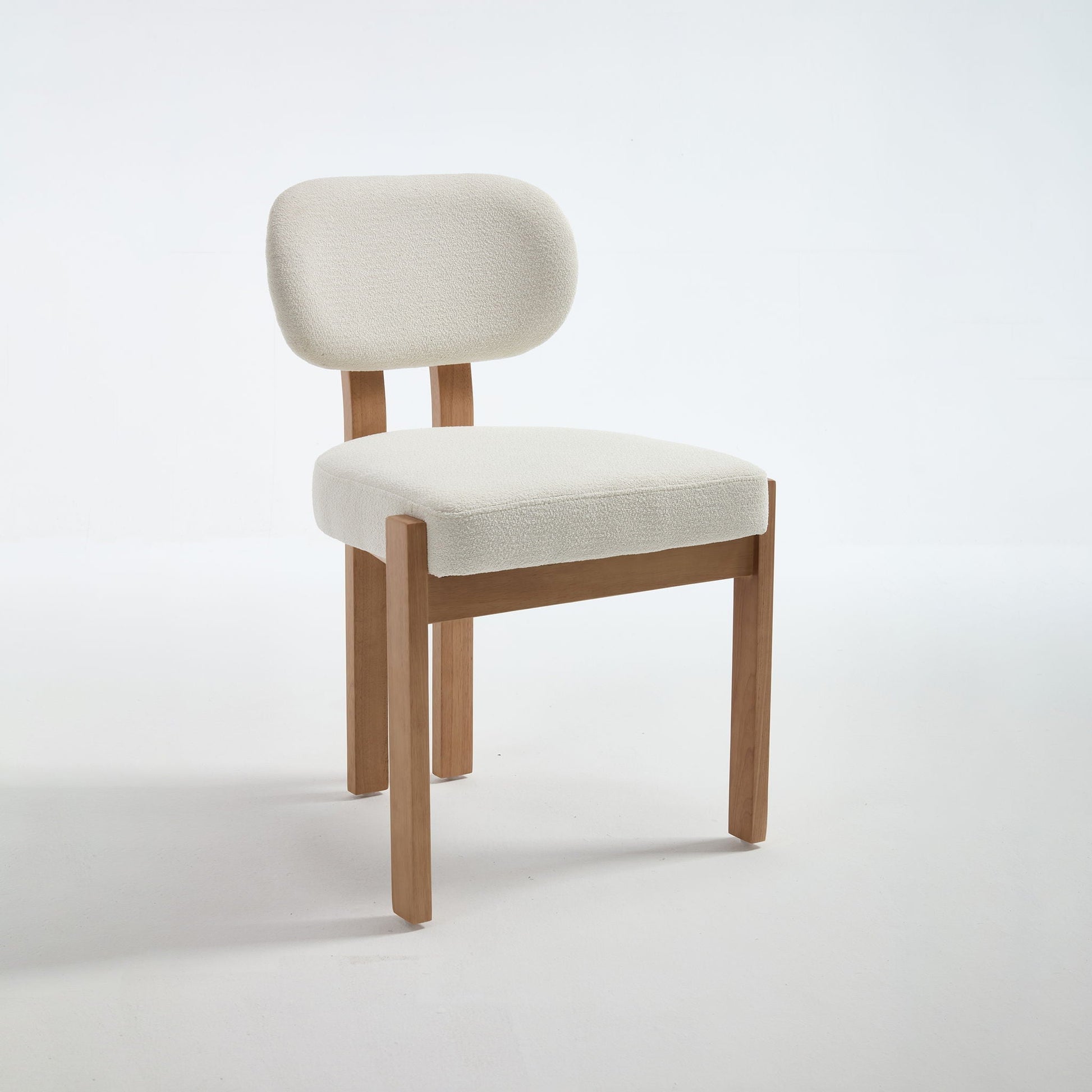 Dining chair beige textured fabric with natural wood legs on Tampa Home & Garden Store