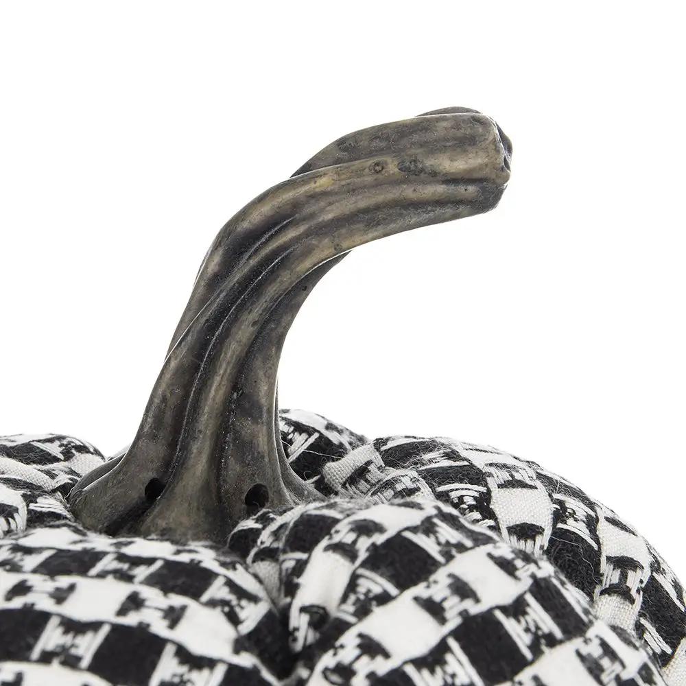 Plaid pumpkin sculpture with curved dark stem wrapped in black and white plaid fabric on Tampa Home & Garden Store