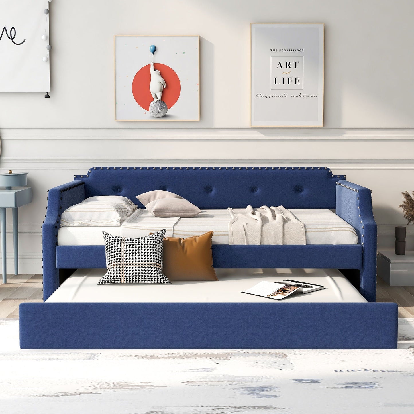 Blue upholstered daybed with pull-out trundle and nailhead trim on Tampa Home & Garden Store