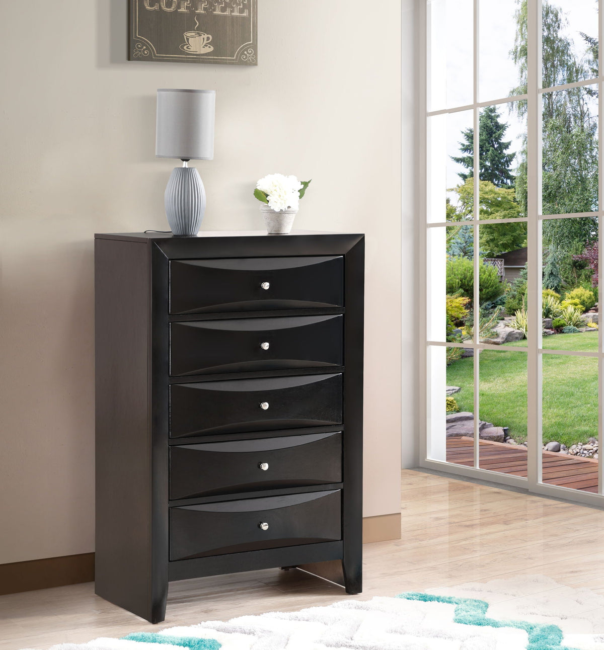 Accent Chest with Molded Resin Drawers in black; gray lamp and white flowers on top on Tampa Home & Garden Store