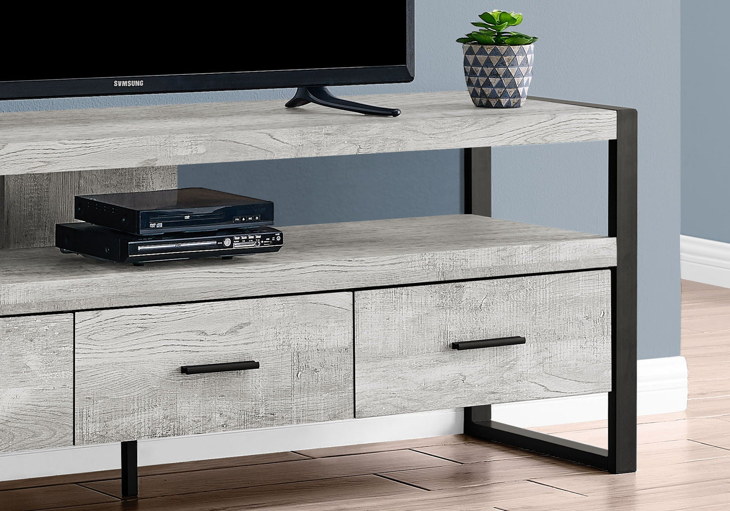TV Stand Console in weathered gray wood with metal legs; holds TV, media players, plant on Tampa Home & Garden Store