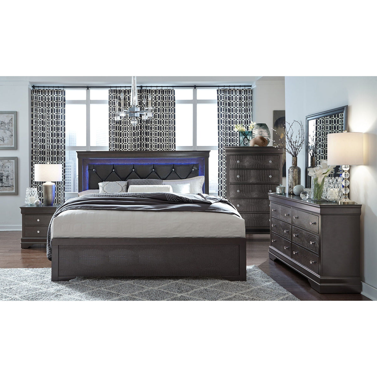 Dark gray crocodile dressers with sparkling knobs flanking a bed in a modern bedroom on Tampa Home & Garden Store