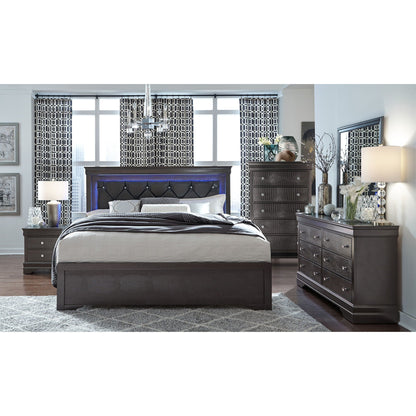Dark gray crocodile dressers with sparkling knobs flanking a bed in a modern bedroom on Tampa Home & Garden Store