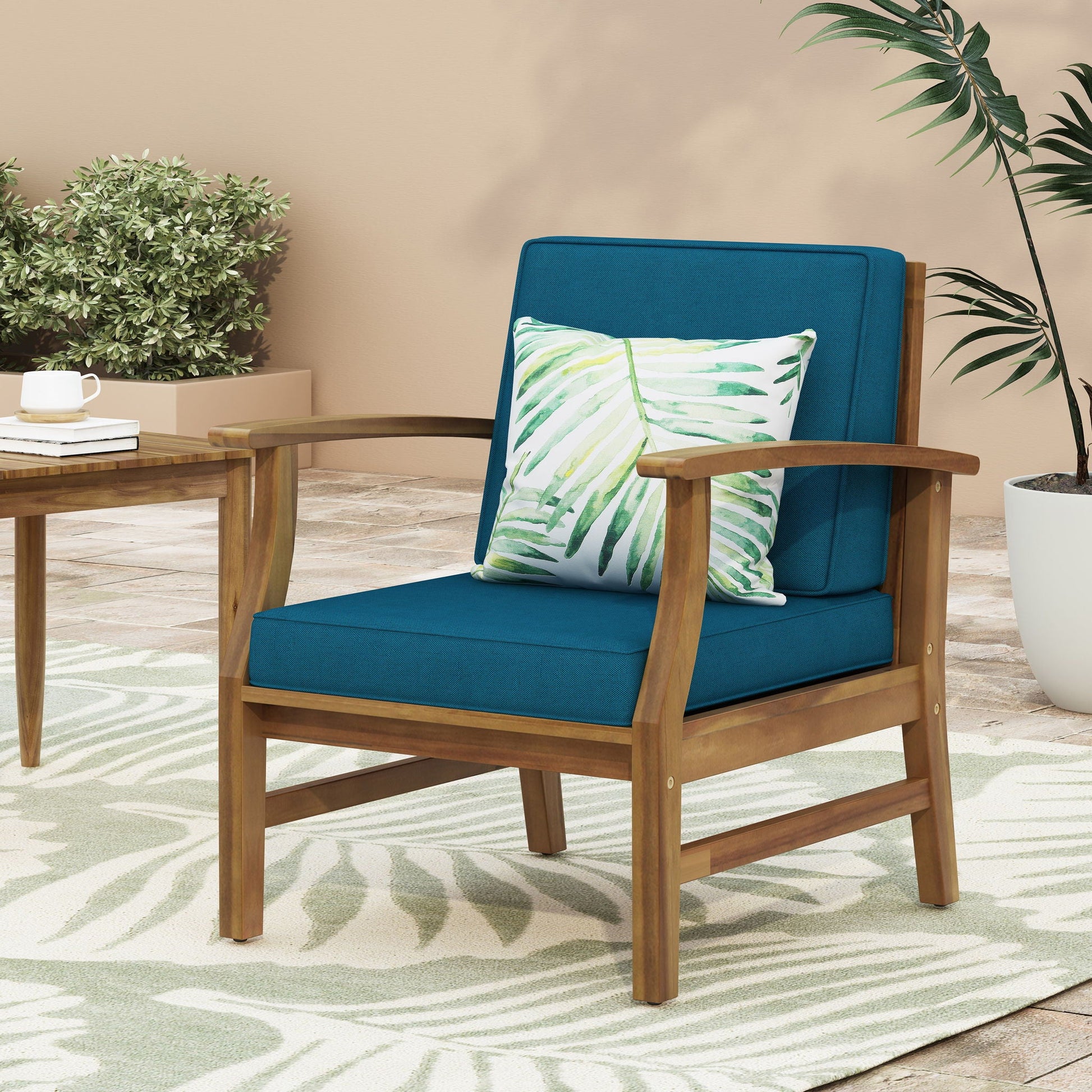 Perla Contemporary Club Chair blue armchair with water resistant cushion and palm pillow on Tampa Home & Garden Store