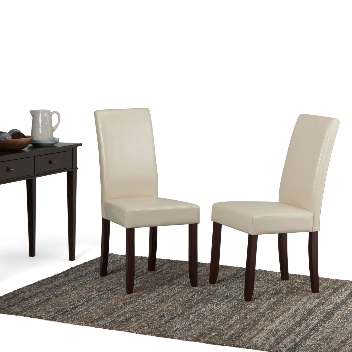 Acadian Upholstered Parson Dining Chair set of 2 in cream fabric with dark wood legs on table on Tampa Home & Garden Store