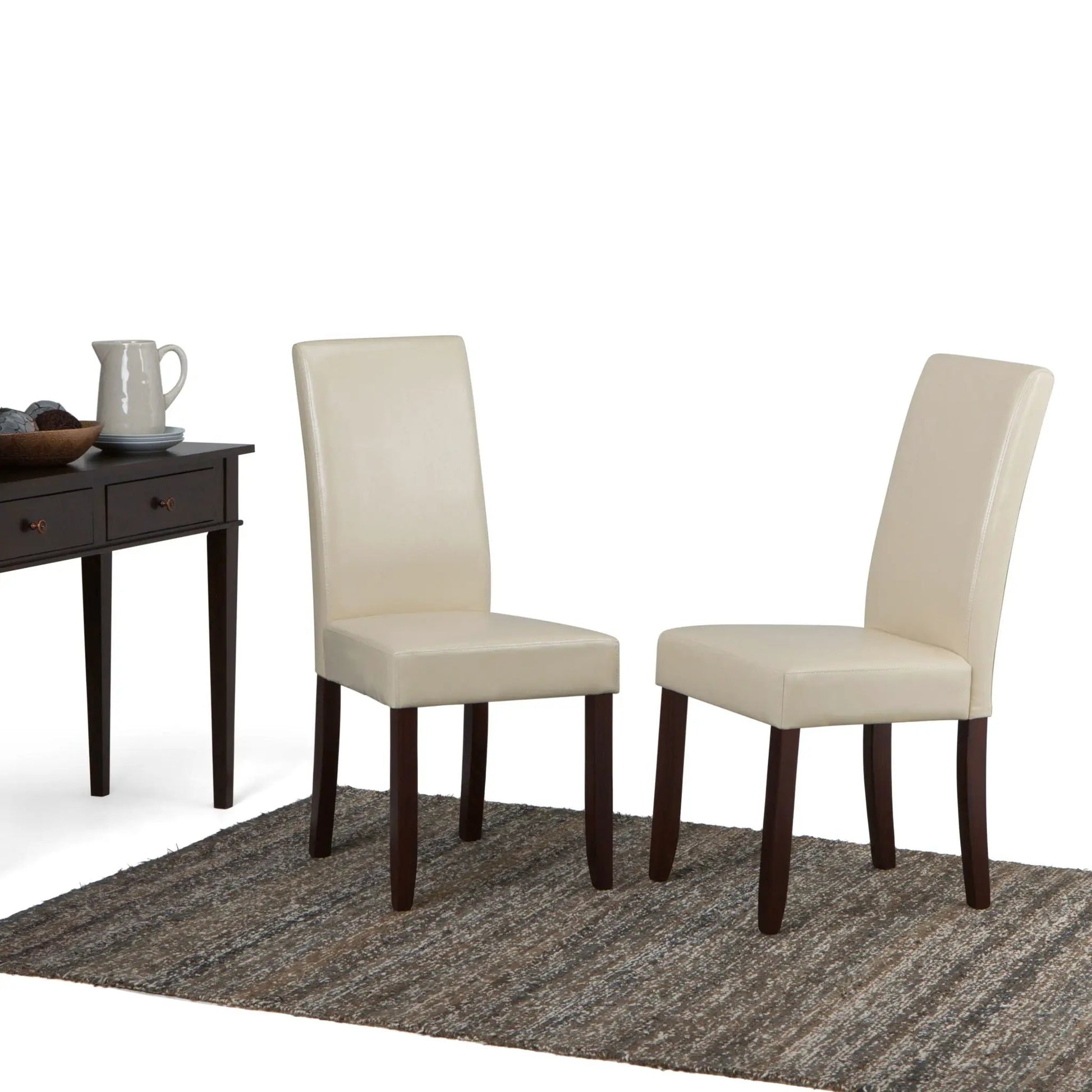 Acadian Upholstered Parson Dining Chair set of 2 in cream fabric with dark wood legs on table on Tampa Home & Garden Store