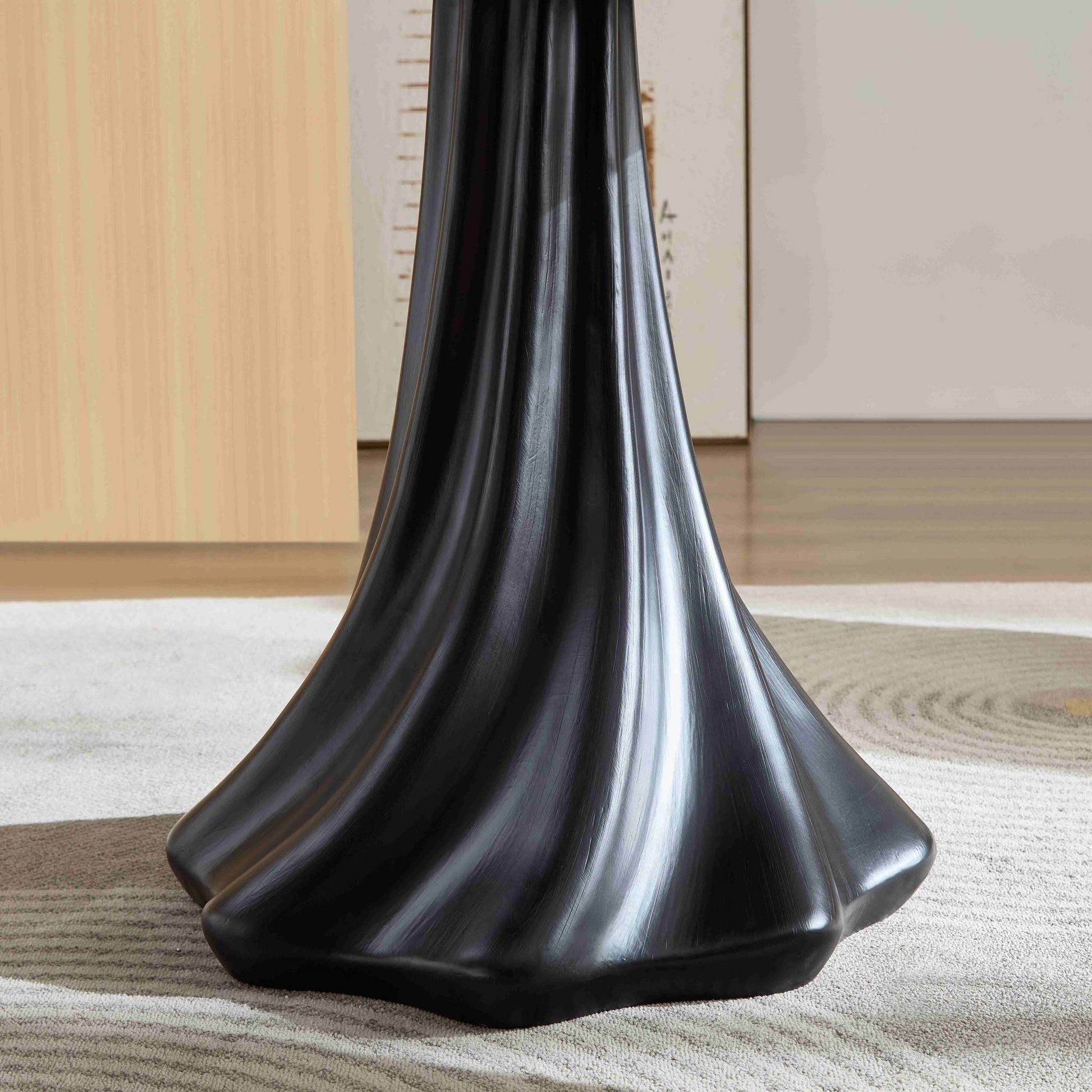 Black sculptural round dining table base with petal root texture, HouseOfZazla on Tampa Home & Garden Store