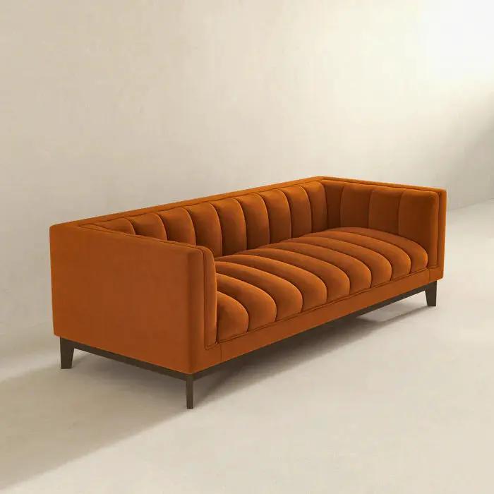 Melissa - Mid Century Modern Sofa orange velvet with channel-tufted cushions and dark legs on Tampa Home & Garden Store