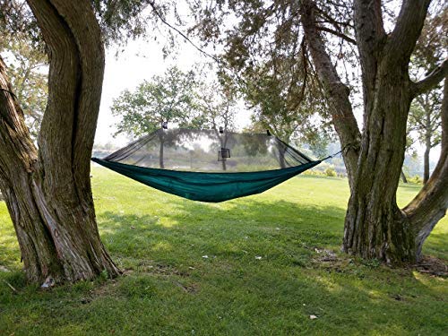 Hammock Tent by River Country Gear in teal suspended between two trees over a green lawn on Tampa Home & Garden Store