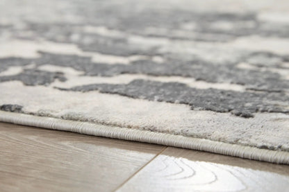 Mazatl rug gray ivory area rug by Unique Piece Furniture with plush pile at edge on wood floor on Tampa Home & Garden Store
