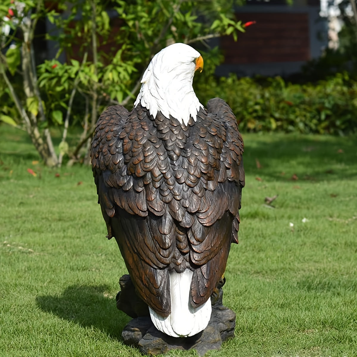 Bald eagle garden statue with white head and brown feathers on a rock base by HouseOfZazla on Tampa Home & Garden Store