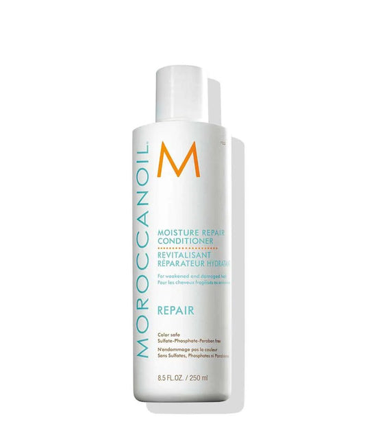 Moroccanoil Moisture Repair Conditioner white bottle with teal branding on Tampa Home & Garden Store