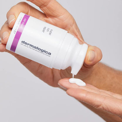 Dermalogica Super Rich Repair moisturizer in white bottle with purple label; cream on fingertip on Tampa Home & Garden Store