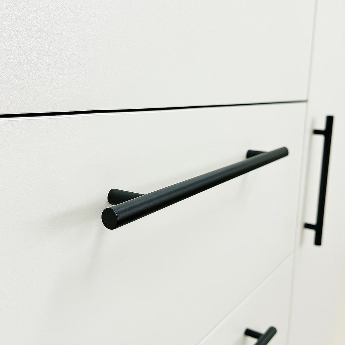 Robin Gentleman’s Chest white finish with black bar pulls, close-up of drawer front on Tampa Home & Garden Store