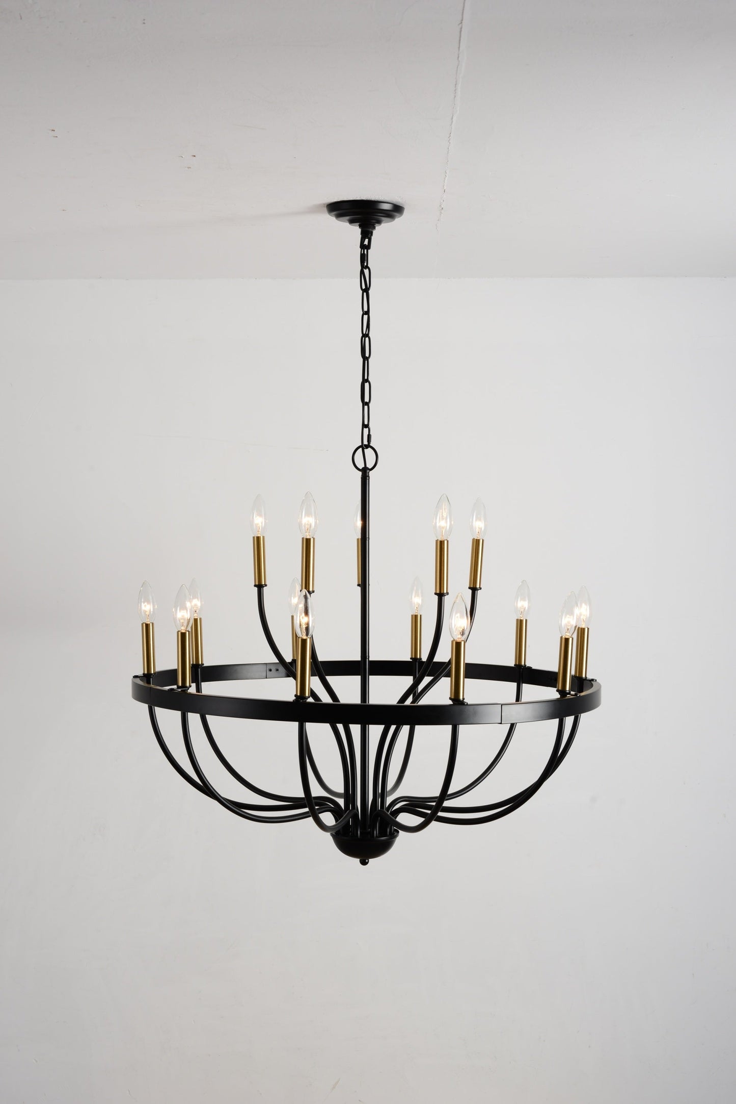18-light industrial iron chandelier with black frame and brass candle sleeves HouseOfZazla on Tampa Home & Garden Store