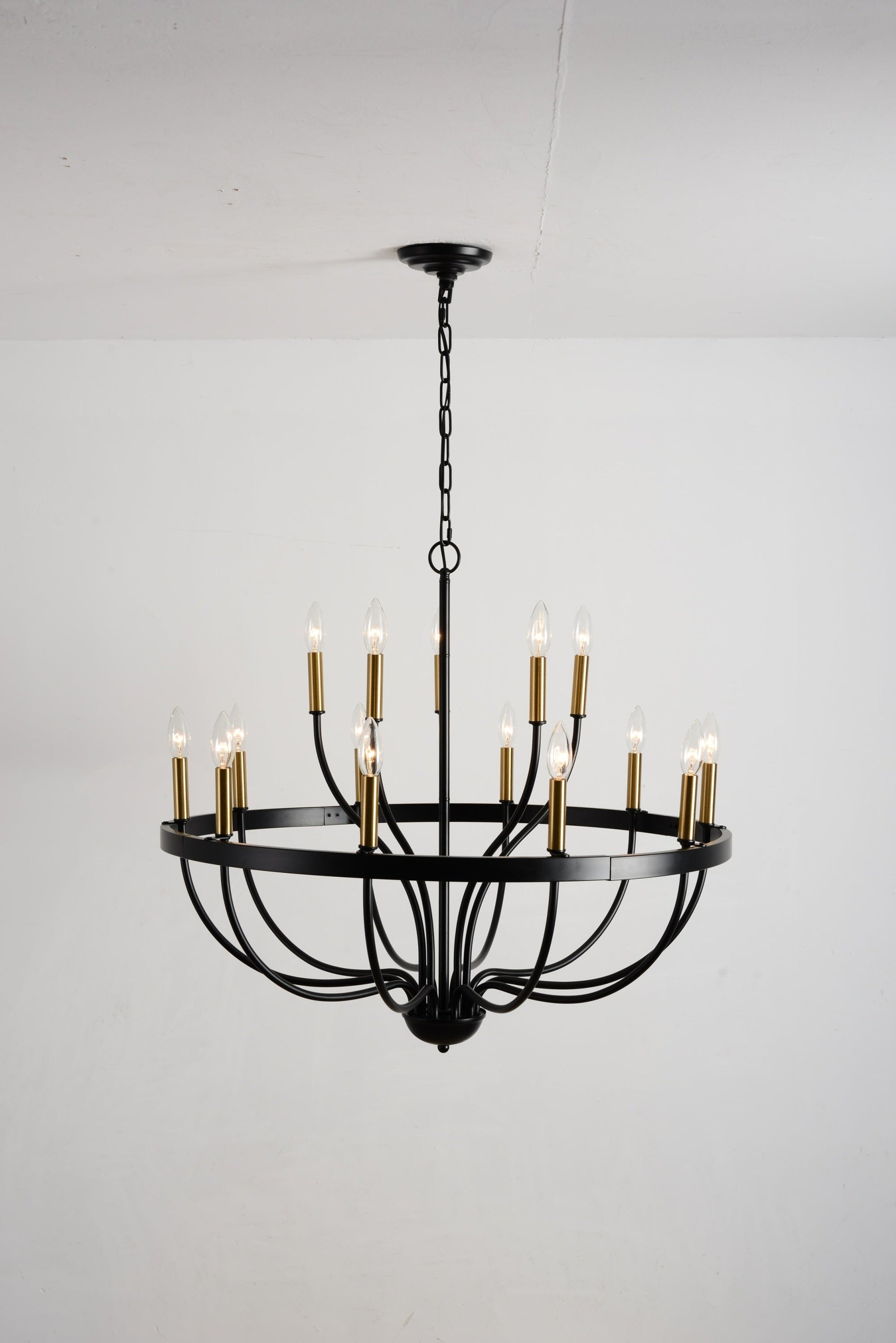 18-light industrial iron chandelier with black frame and brass candle sleeves HouseOfZazla on Tampa Home & Garden Store