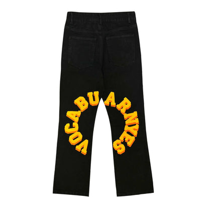 Men's and Women's black denim jeans with yellow block-letter embroidery along the legs on Tampa Home & Garden Store