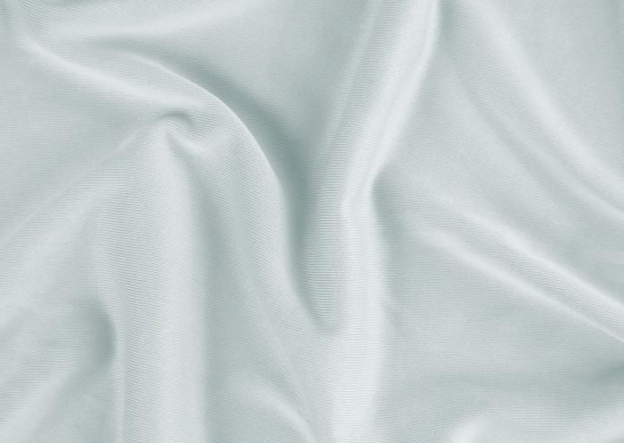 BedGear Dri-Tec crib sheet fabric in light green with soft folds on Tampa Home & Garden Store