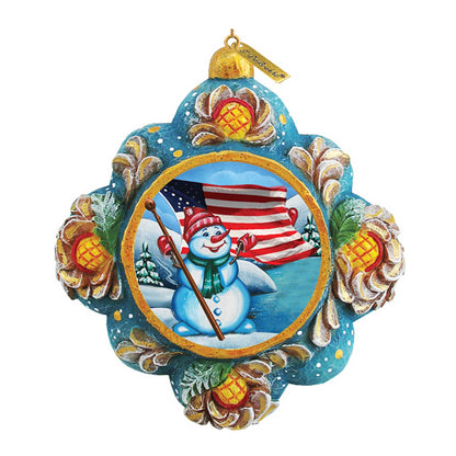 Patriotic snowman ornament sculpted by G. DeBrekht with blue frame and flag motif on Tampa Home & Garden Store