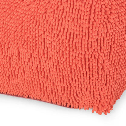 Spongy square pouf fabric close-up in bright coral orange plush texture on Tampa Home & Garden Store