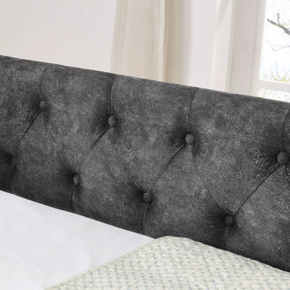 Upholstered daybed in dark grey textured fabric with tufted detailing on Tampa Home & Garden Store