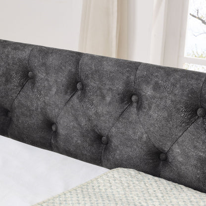Upholstered charcoal gray daybed with button tufting on Tampa Home & Garden Store