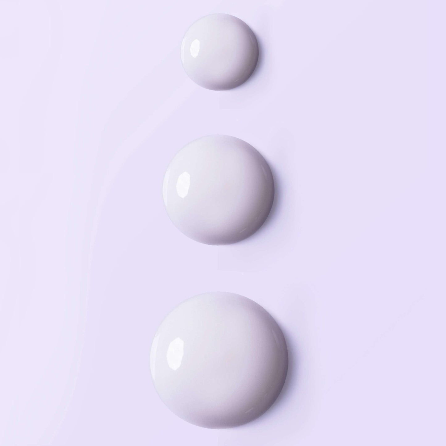 Esthederm Intensive Vitamin C Serum 3 white beads on lavender background on Tampa Home & Garden Store